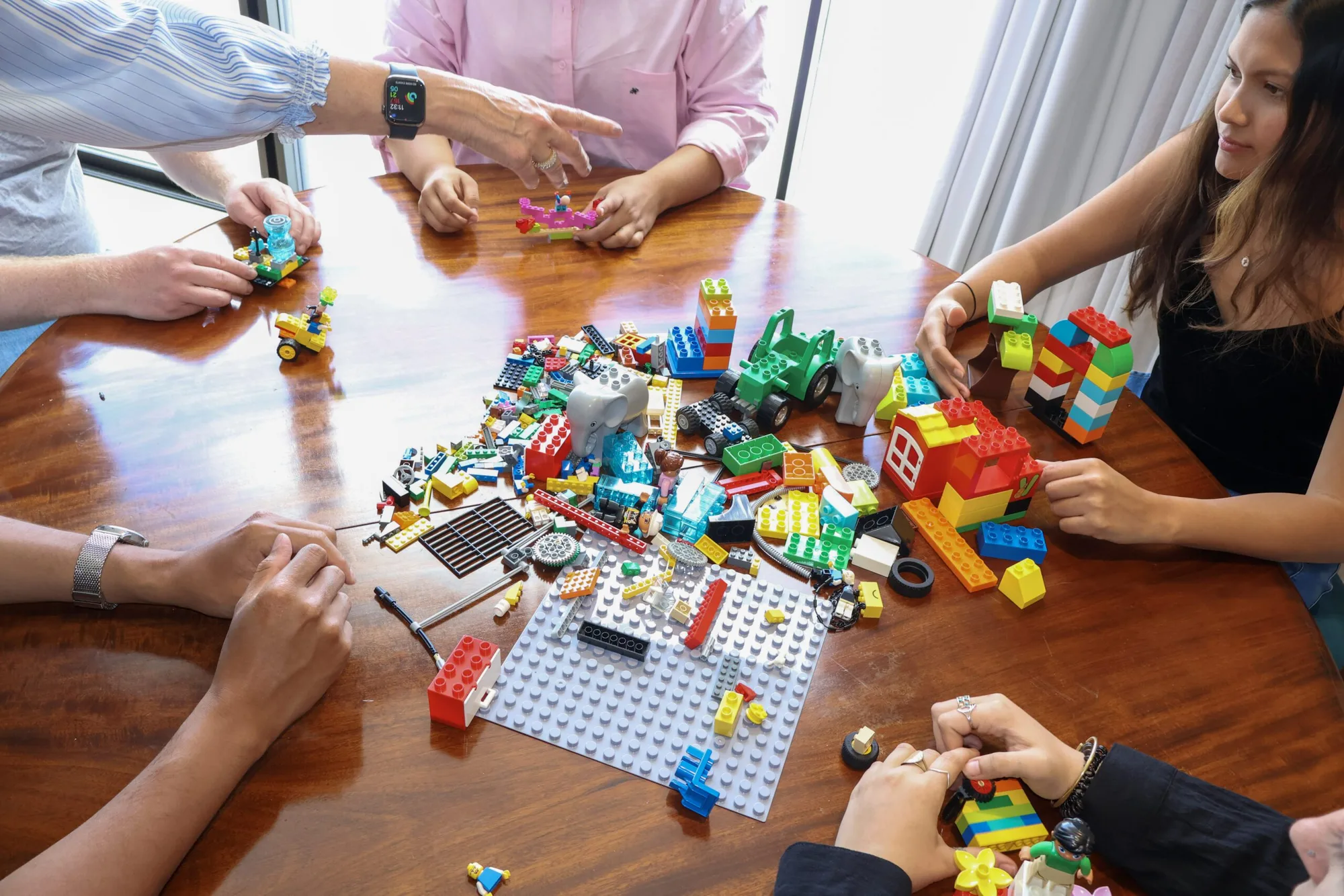 A close-up of a complex LEGO model built during a certification workshop.