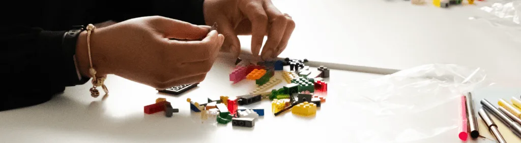 A collection of LEGO models representing team trust and connection.
